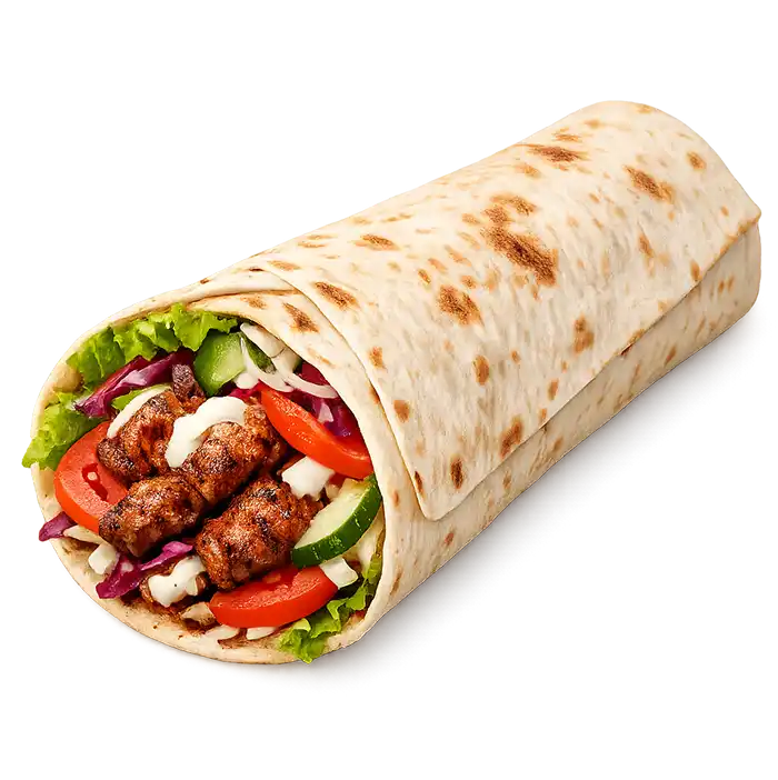 Pikantny kebab wrap z grillowanym mięsem, świeżymi warzywami i ostrym sosem